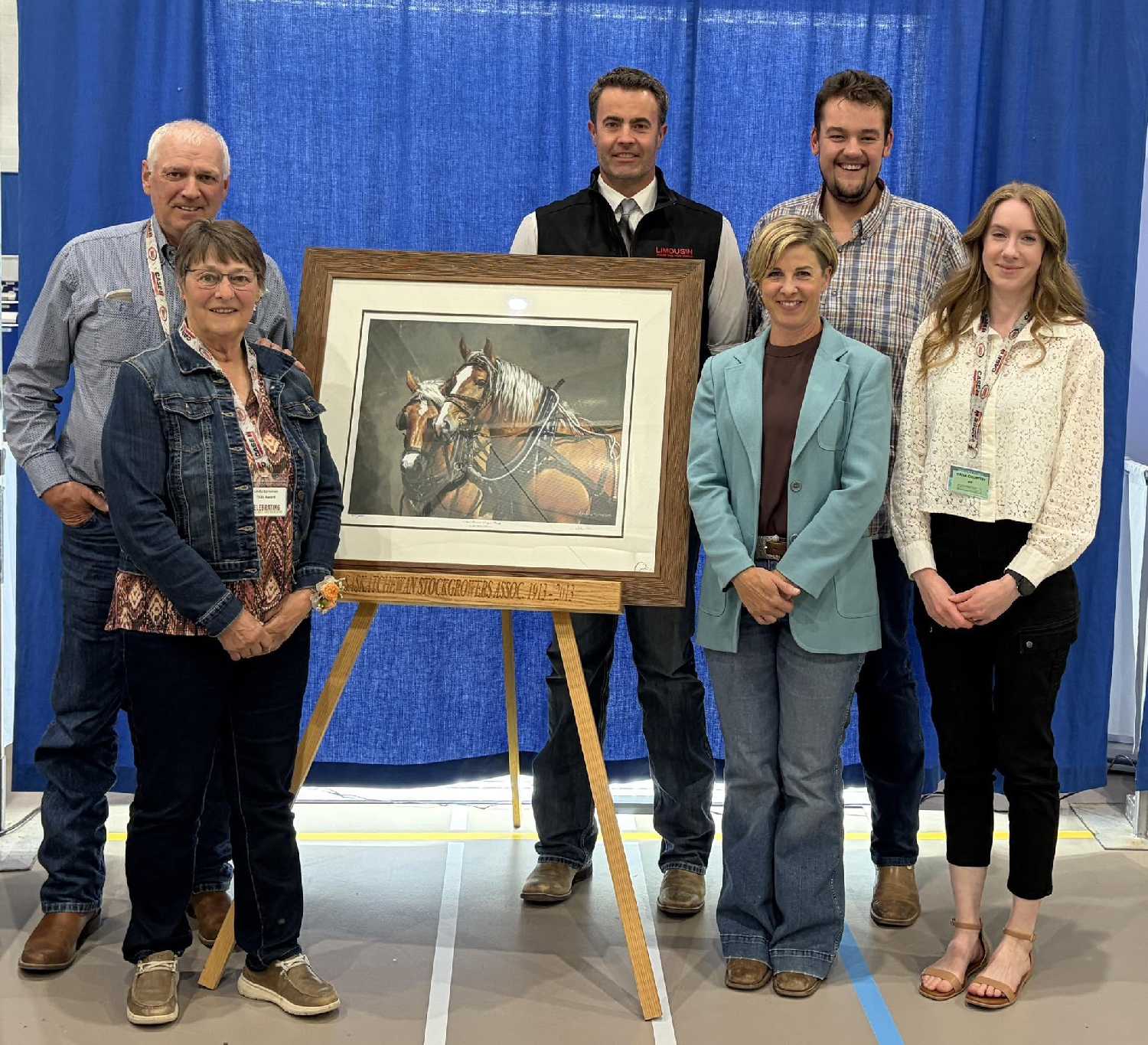 Ralph and Linda Corcoran, left, receiving the 2026 Environmental Stewardship Award from the Saskatchewan Stock Growers Association.